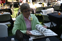 Judy (Treffry) Robinet looking at a Manzanita